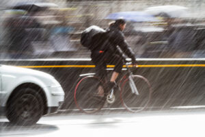 Motion,Blur,Picture,Of,A,Cyclist,In,The,Traffic,Of